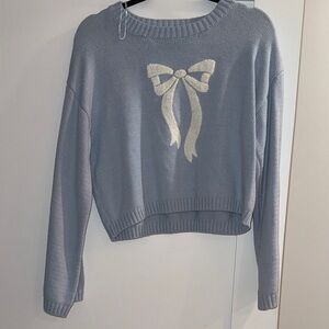 Women's Blue Sweater with Bow Design